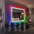 Load image into Gallery viewer, Rectangular bathroom LED mirror with adjustable RGB backlighting and anti-fog feature mounted on wall