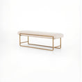 Load image into Gallery viewer, Minimalist beige upholstered bench with brass-finished steel frame and dramatic bullnose edging on white background