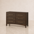 Load image into Gallery viewer, A dark brown wooden dresser with six drawers and brass bar handles, set against a neutral beige background.