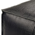 Load image into Gallery viewer, Close-up of black patterned leather pouf with topstitching detail on a white background