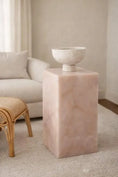 Load image into Gallery viewer, Emma Pink Onyx Table in living room by sofa and chair on an accent rug