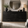 Load image into Gallery viewer, Maura 9-Drawer Dresser in bedroom with decor on top and a mirror