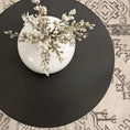 Load image into Gallery viewer, accent table black above view with vase on it and area rug underneath