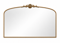 Load image into Gallery viewer, arched mirror with a decorative gold-toned frame and a central sculpted crest, shown against a plain white background.