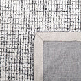 Load image into Gallery viewer, area rug close-up folded