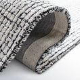 Load image into Gallery viewer, area rug side view folded over