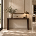 Load image into Gallery viewer, A dark brown console table styled in a modern living room setting, holding a large textured beige vase with green branches, a stack of books, a small bowl, and a bronze dome lamp.