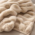 Load image into Gallery viewer, A close-up of a plush, chunky faux-fur blanket in a warm cream or beige color, draped to show its soft texture and ribbed pattern.