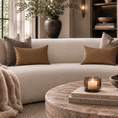 Load image into Gallery viewer, faux leather pillow with other pillows on a sofa across from coffee table with coffee books on it