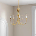 Load image into Gallery viewer, gold chandelier in an indoor space