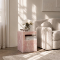 Load image into Gallery viewer, HARPER ONYX STONE TABLE next to sofa and beside a window with a curtain