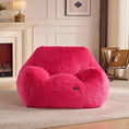 Load image into Gallery viewer, PINK PUFF FLOOR CHAIR in room with fireplace and a small lamp