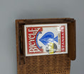 Load image into Gallery viewer, Wooden travel cribbage board with built-in compartment holding a deck of Bicycle playing cards on gray background