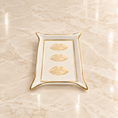 Load image into Gallery viewer, A rectangular white ceramic tray with gold trim and three embossed gold kiss marks, displayed on a beige marble surface.
