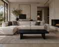 Load image into Gallery viewer, A modern living room featuring a large off-white sectional sofa with dark throw pillows, luka coffee table, a textured beige rug, and a built-in fireplace on the right.