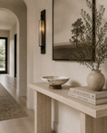 Load image into Gallery viewer, marble bowl on console table in hallway under artwork hanging on the wall