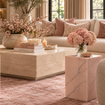 Load image into Gallery viewer, Pink onyx table with blush flowers beside a cream sofa in a living room