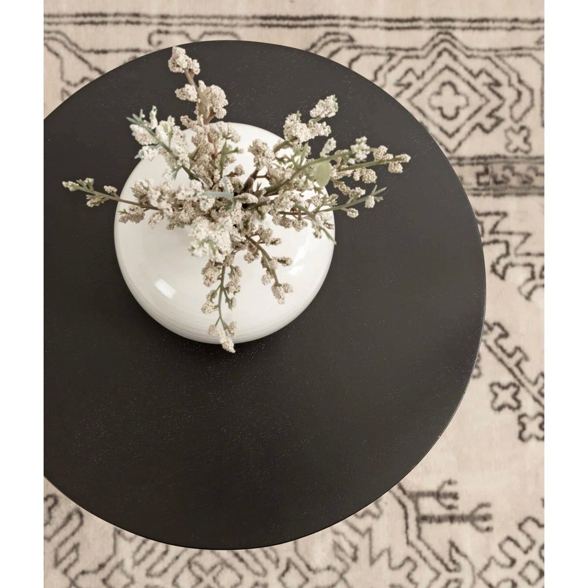 above view of a vase with stems
