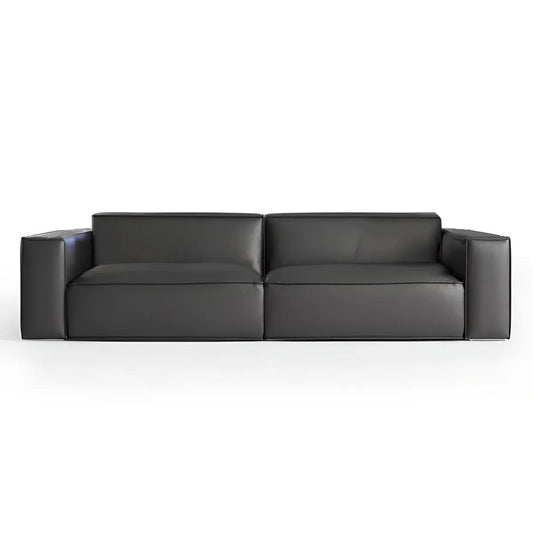 A sleek, modern Black Modern Sofa with wide armrests and minimalistic design exudes luxury against a white background. The BLACK MODERN SOFA by House of Effy showcases elegance and contemporary style seamlessly.