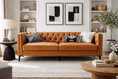 Load image into Gallery viewer, 2 piece sofa in room with contemporary decor including art work, accent tables and a table lamp
