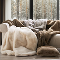 Load image into Gallery viewer, Faux Chinchilla Throw and other colors draped over a sofa in a living room next to a window
