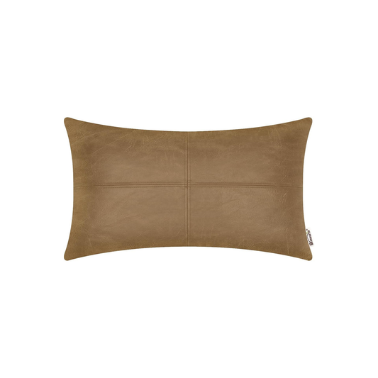 Faux leather pillow with subtle stitching details on a white background