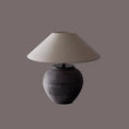 Load image into Gallery viewer, A House of Effy RETRO LAMP with a textured, dark-colored base and a beige, cone-shaped shade set against a plain background.
