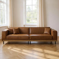 Load image into Gallery viewer, Leather 2-Cushion Sofa in Room With Windows and Drapes
