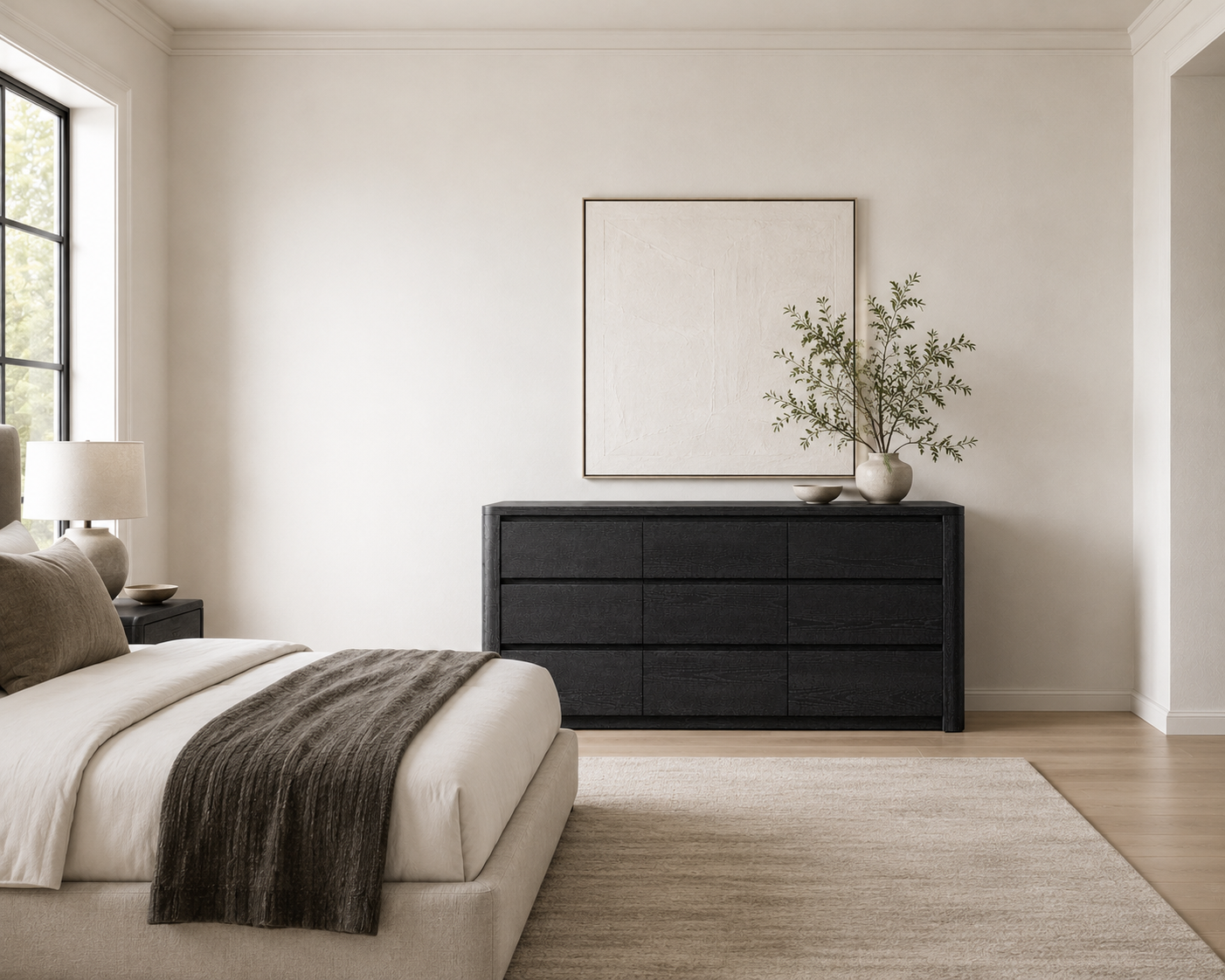 Maura Dresser in bedroom with a faux plant and bed
