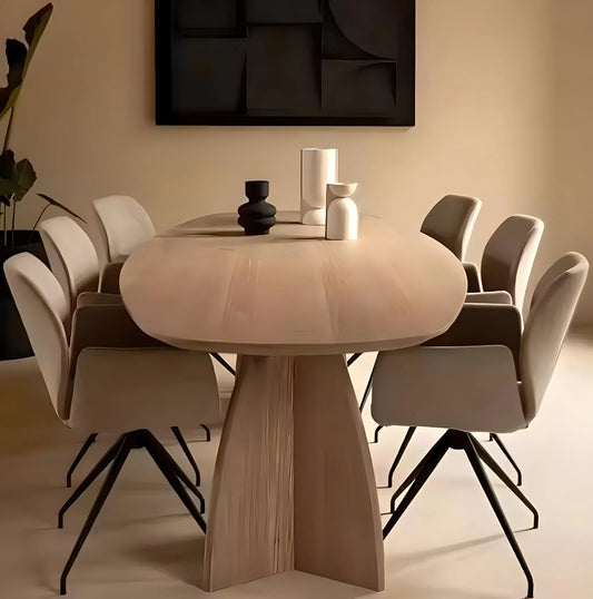 A modern dining room with a MODERN DINING TABLE from House of Effy, crafted from premium wood, surrounded by six beige chairs. The table is decorated with three minimalist vases. The wall behind features an abstract black artwork, epitomizing modern design.