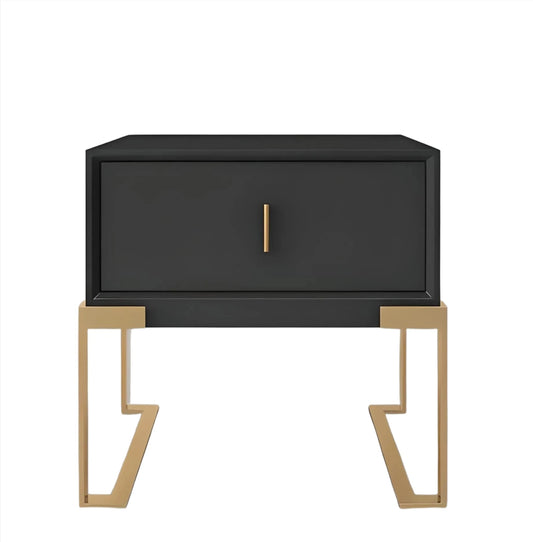 A CONTEMPORARY BLACK NIGHTSTAND from House of Effy with a single drawer, featuring gold legs and a matching gold handle, crafted from solid wood and set against a white background.