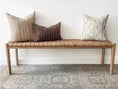 Load image into Gallery viewer, A sleek, contemporary WOODEN CONTEMPORARY BENCH with three patterned pillows sits against a white wall on a patterned rug, showcasing its premium quality wood. This product is from House of Effy.
