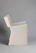 Load image into Gallery viewer, Side view of a luxurious, modern, geometric white CONTEMPORARY FABRIC DINING CHAIR by House of Effy with a high backrest set against a plain gray background.
