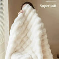 Load image into Gallery viewer, A person covers their face with a large, white, fluffy blanket labeled "TUSCAN THROW," made from plush material that ensures winter warmth by House of Effy.
