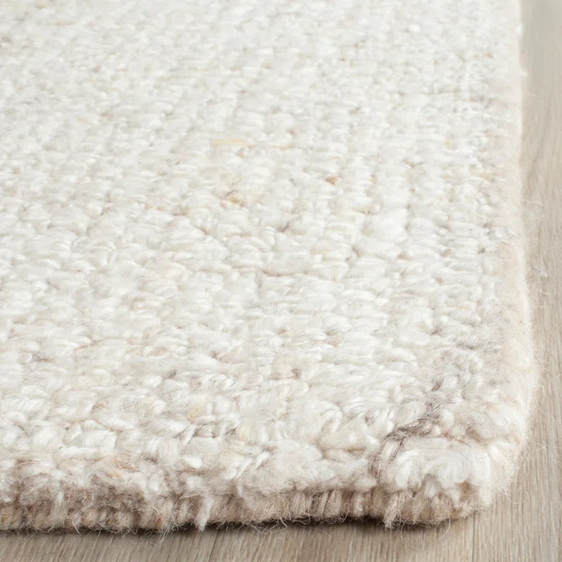 area rug zoomed in view of corner of rug to see fabric fibers