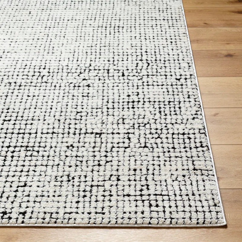 area rug corner on hardwood floor