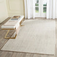 Load image into Gallery viewer, area rug in room with bench and french doors

