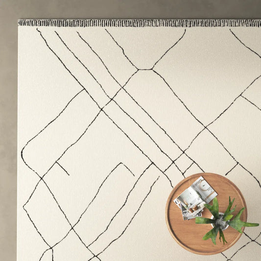 Isla Moroccan Area Rug with table on it
