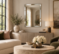 Load image into Gallery viewer, Beveled wall mirror above a console table in a modern living room
