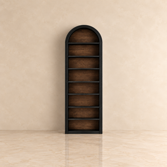 black arched bookcase alone in a room with beige walls