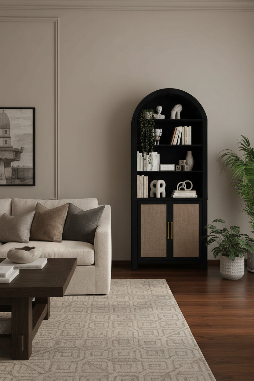 black bookcase in living room across from sofa