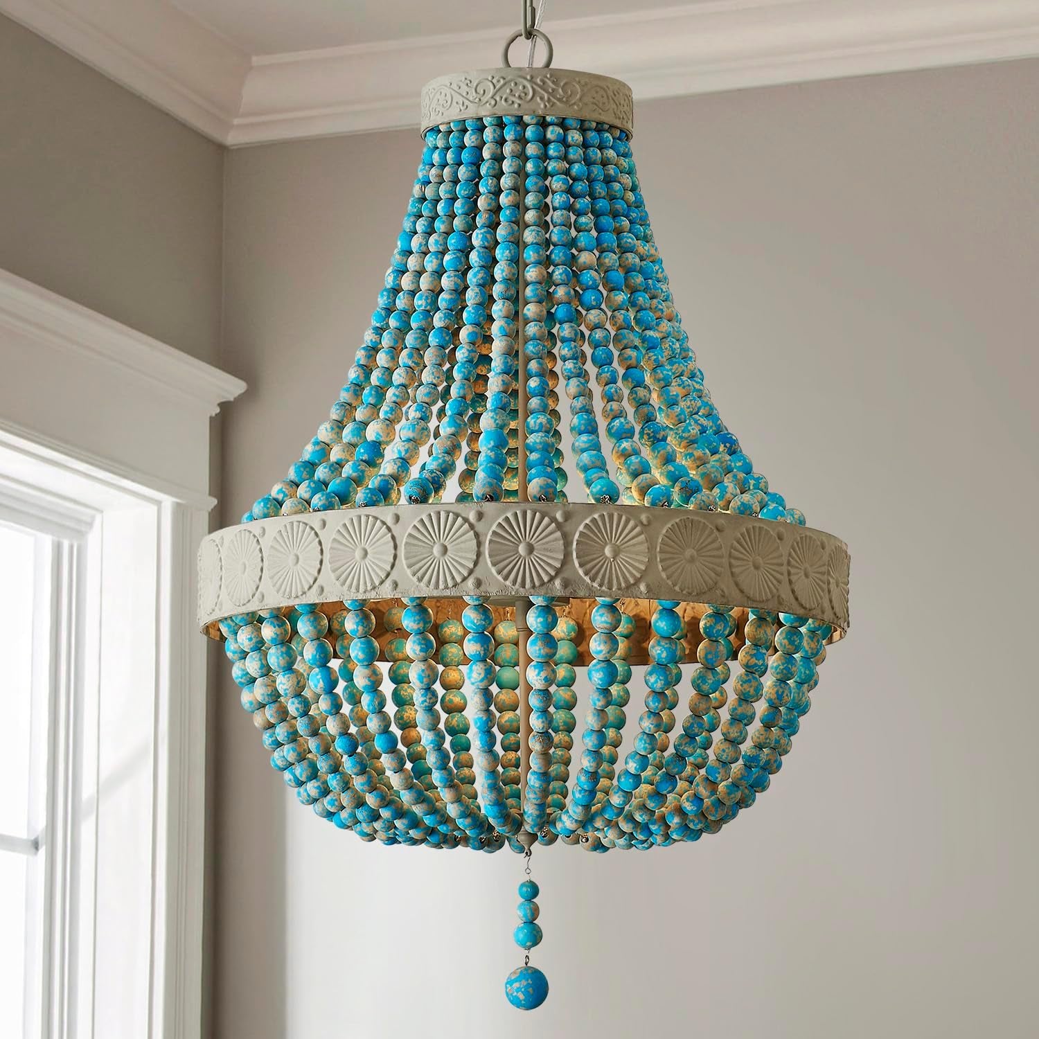 boho beaded chandelier hanging in room