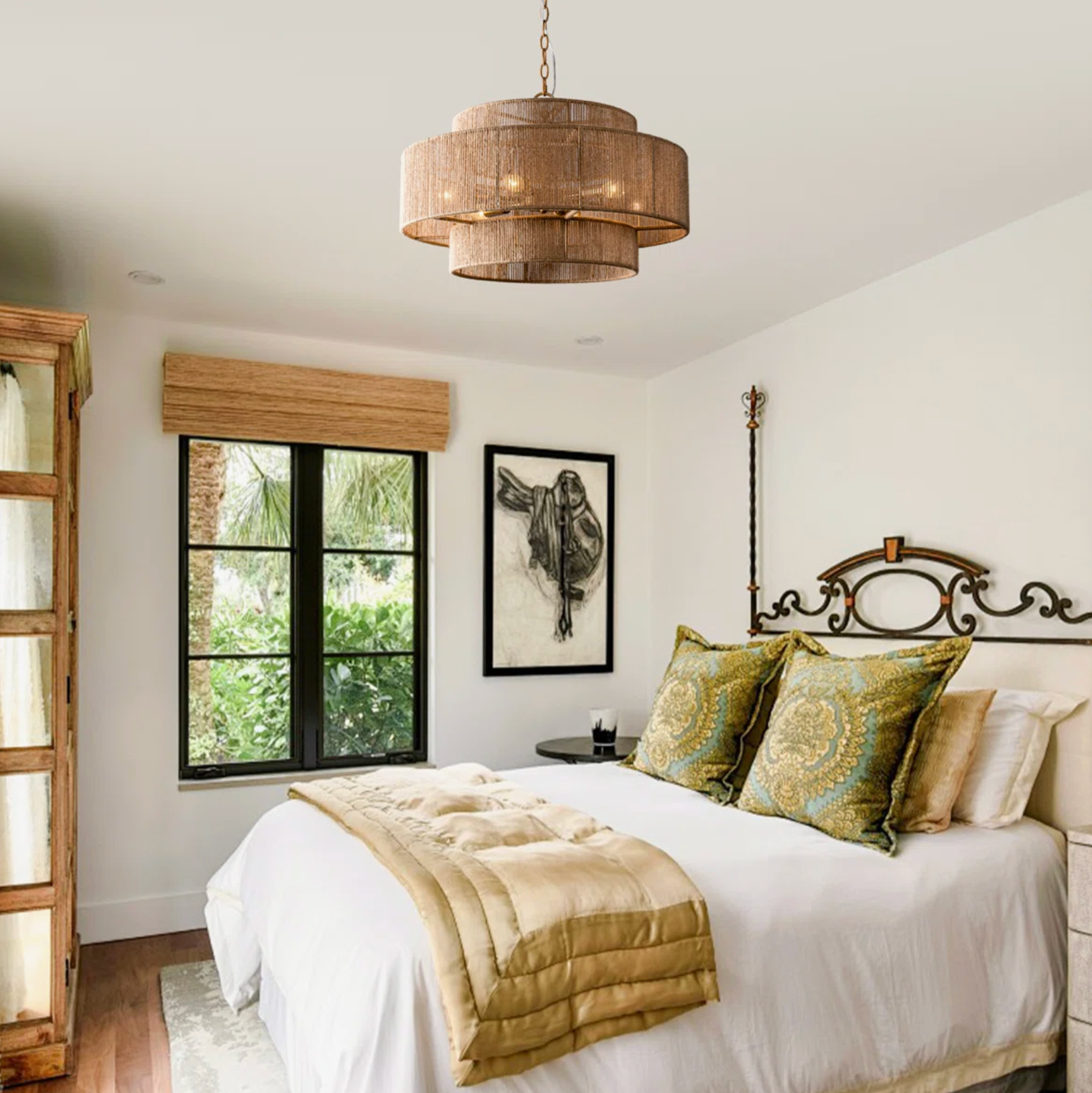 boho chandelier in bedroom above bed