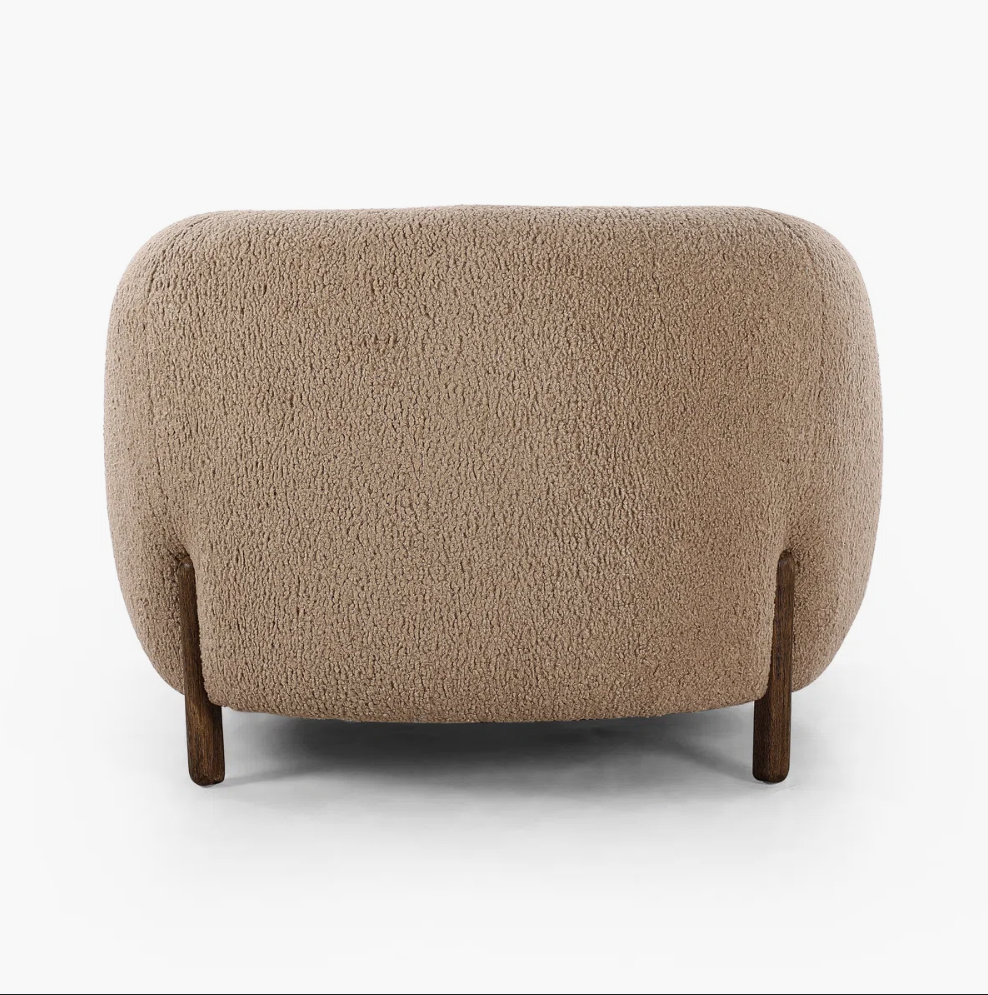 boucle barrel chair back view with white background