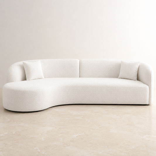 boucle curved sofa with nothing on it