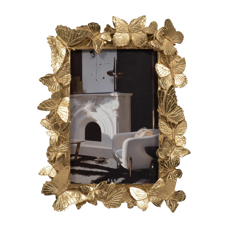 gold picture frame with white background