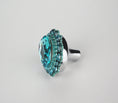 Load image into Gallery viewer, Light turquoise crystal cabinet knob with polished nickel base and decorative rhinestone accents on white background

