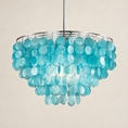 Load image into Gallery viewer, A modern capiz shell chandelier featuring a circular silver metal frame adorned with cascading, translucent light blue disc-like elements, suspended from a single central rod against a plain beige background.
