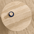 Load image into Gallery viewer, A round beige marble-patterned coffee table or tray with a small blue and white cup placed on top, photographed from above on a textured beige surface.
