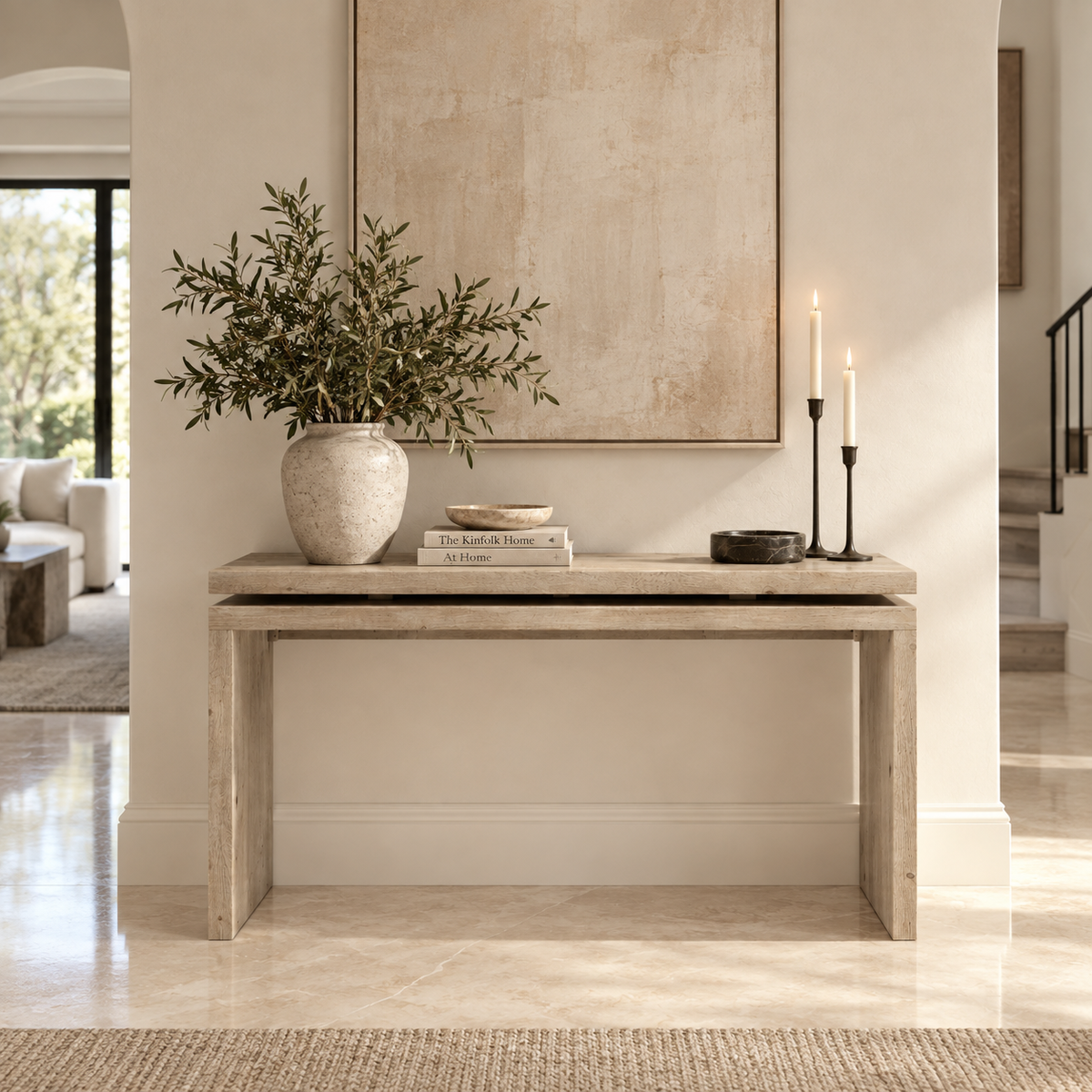 console table with decor on it inside a home